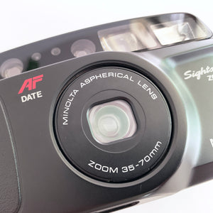 minolta camera zoom lens